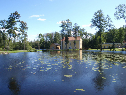 Guest House view of a Pond and Property.